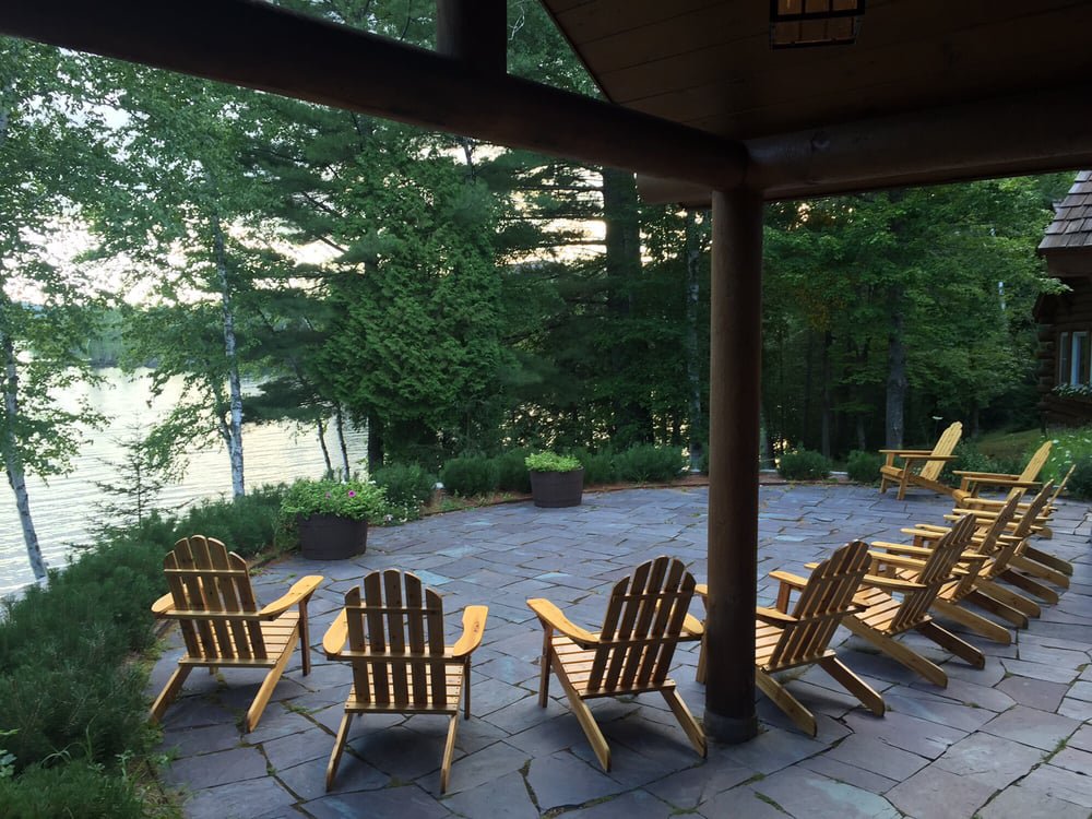 photo-of-wooden-outdoor-chairs-on-back-patio-in-half-circle.jpg